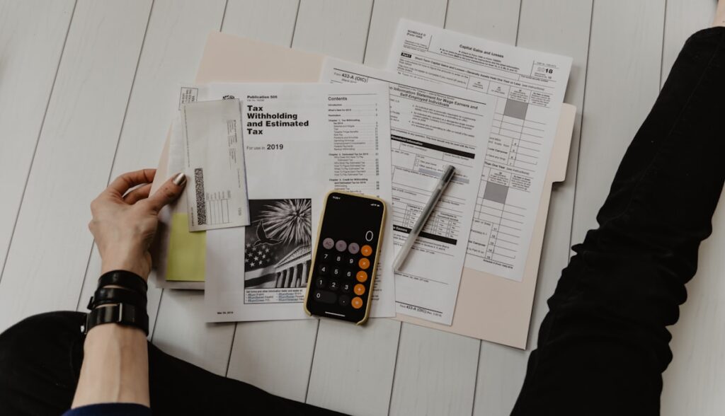 Calculator and paperwork on a desk